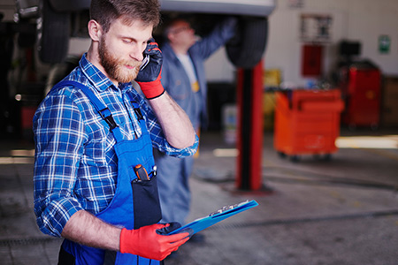 Small business owner reviewing ad results